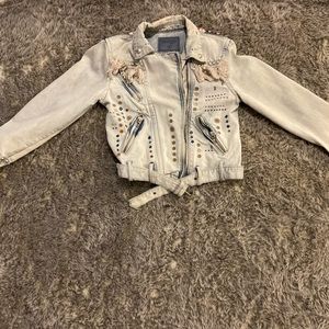 Size small very cute denim jacket with nice detail